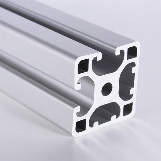 End view cross-section of a 4040 aluminum profile showing two open T-slots and two smooth flat walls in a black anodised finish